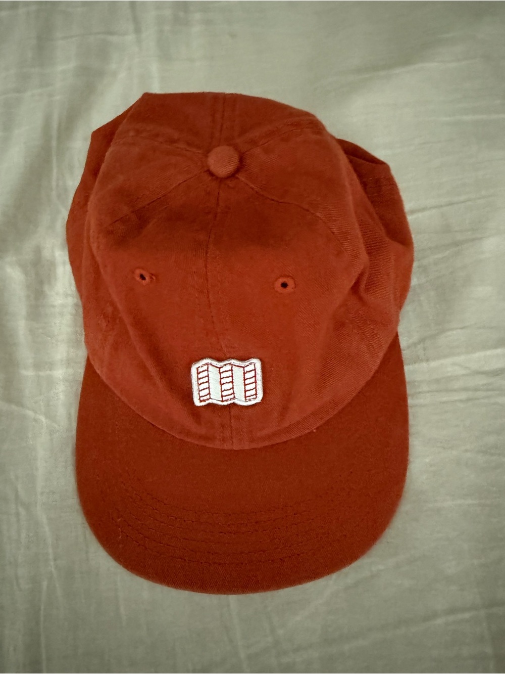 Rust Red Baseball Cap with Embroidered Patch